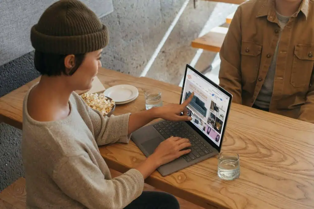 Small business owners reviewing a WordPress website together